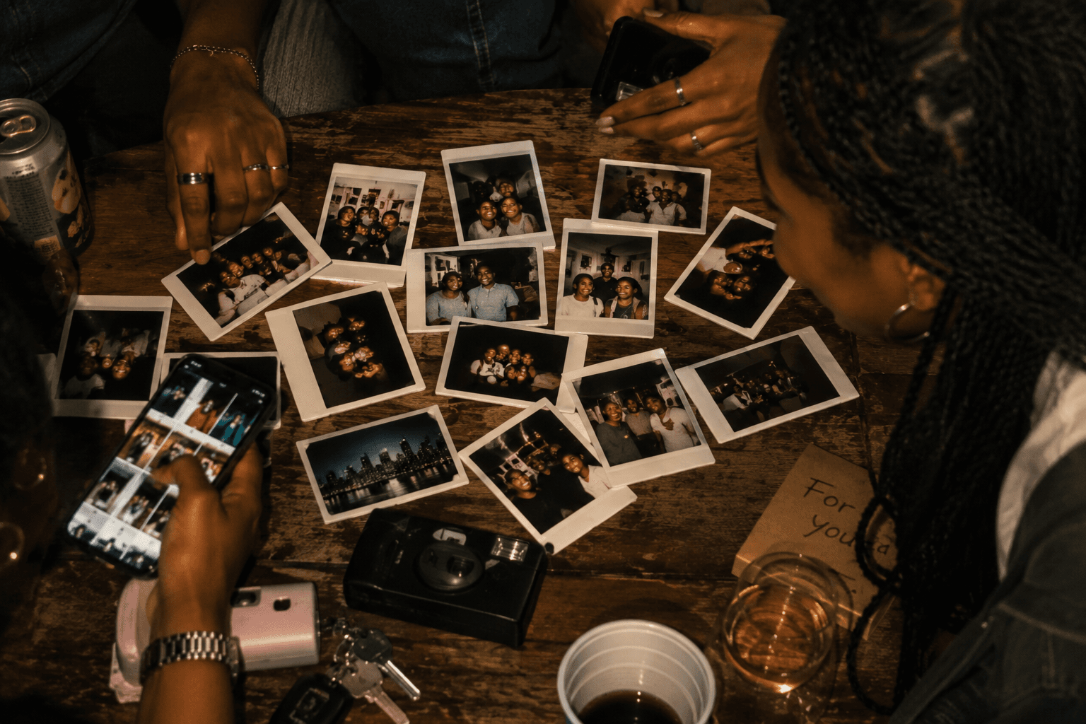 instant photos laid out on a table
